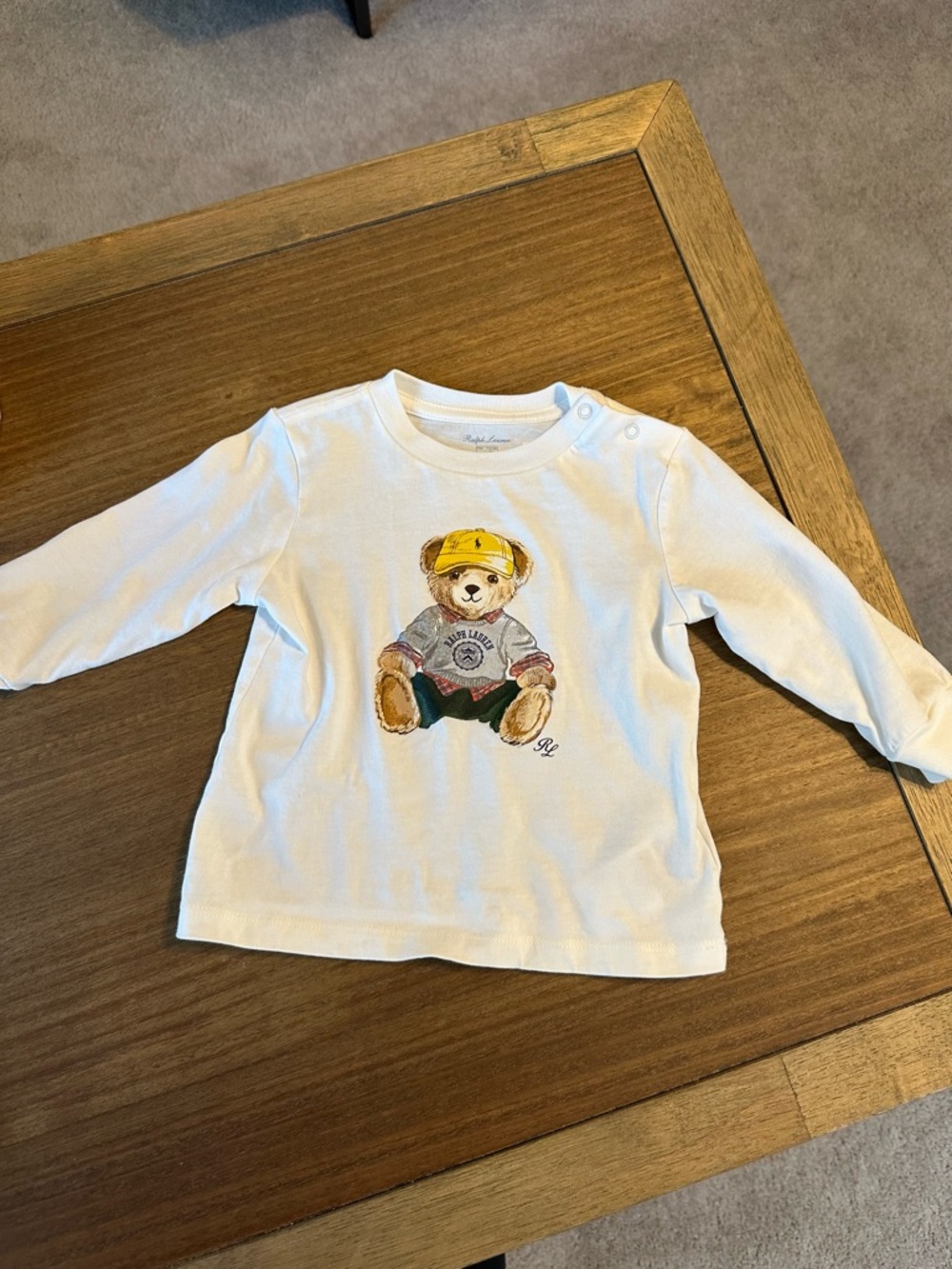 6-9 months. Worn once. Ralph Lauren White Long-Sleeve Tee